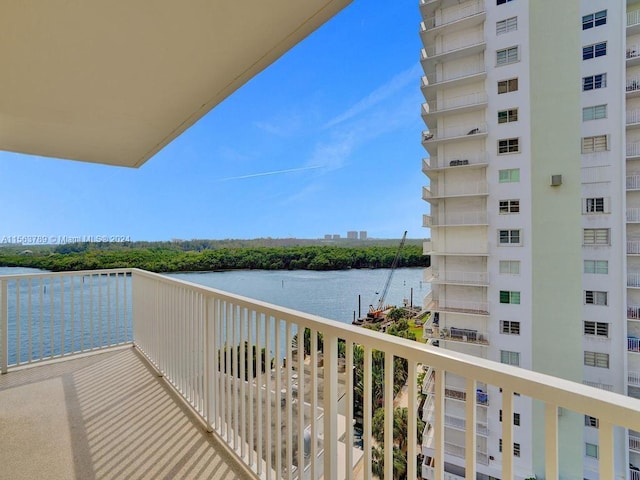 balcony featuring a water view