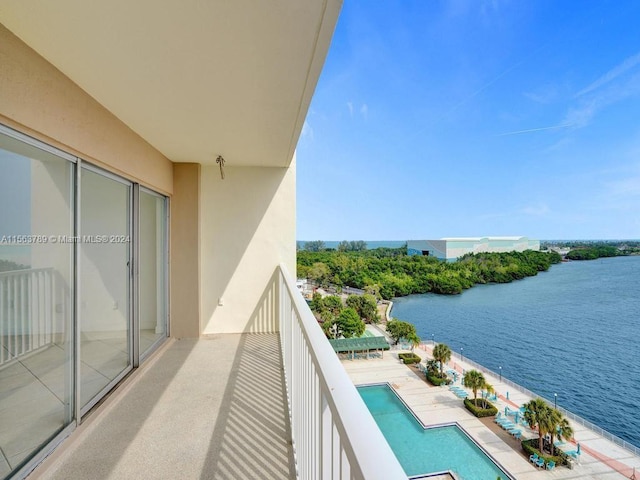 balcony featuring a water view