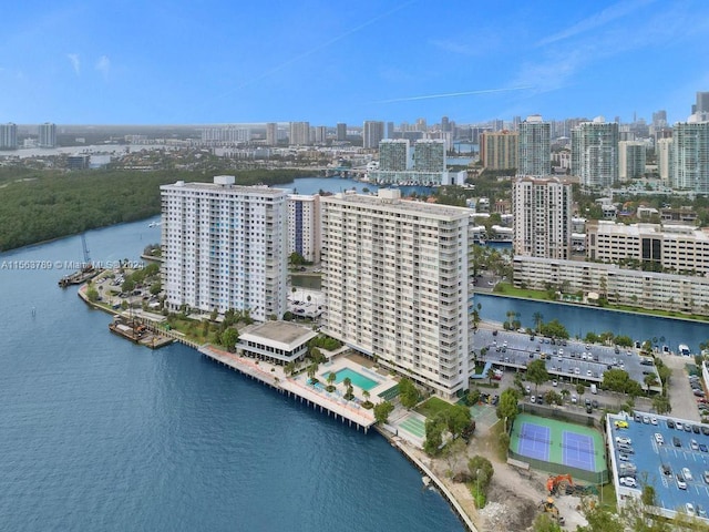 birds eye view of property featuring a water view