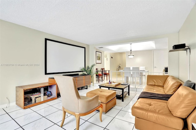 tiled cinema room with a textured ceiling