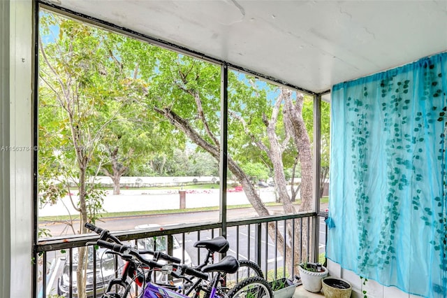 unfurnished sunroom with a wealth of natural light