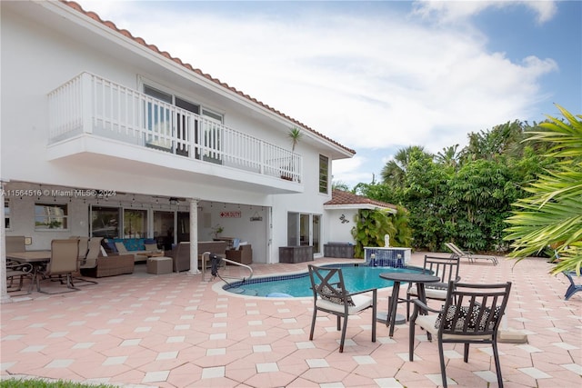 view of pool with an outdoor hangout area and a patio