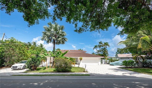 view of front of property with a garage