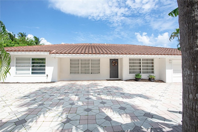 view of front of property with a patio