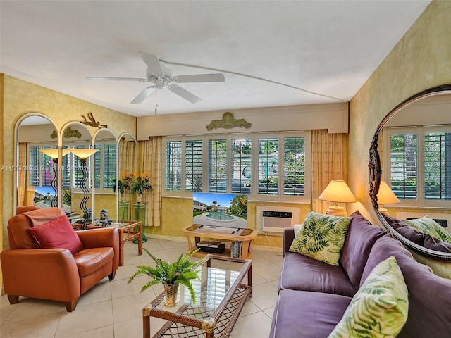 living room featuring ceiling fan and light tile floors