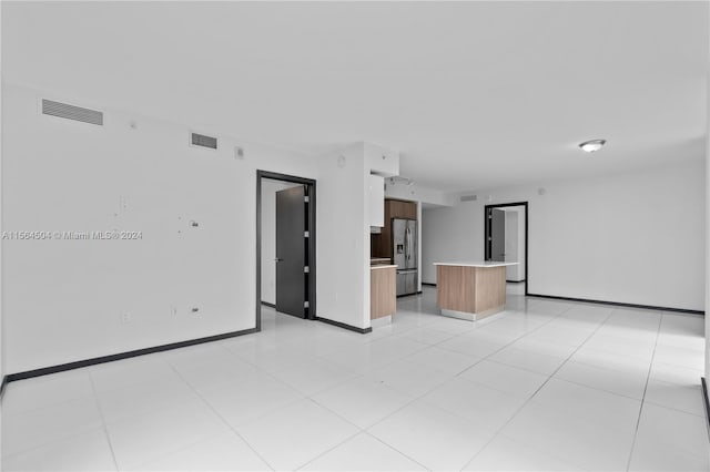 interior space with light tile patterned floors