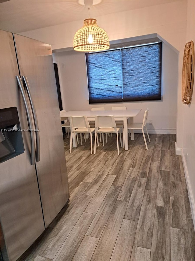 dining area featuring hardwood / wood-style floors