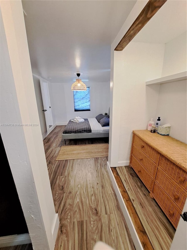 bedroom featuring dark wood-type flooring