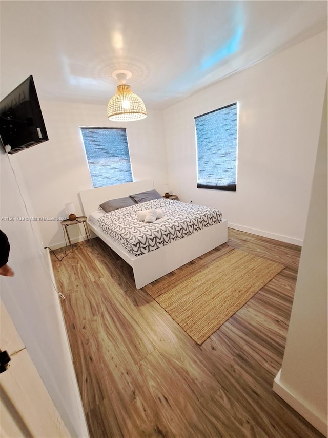 bedroom featuring light wood-type flooring