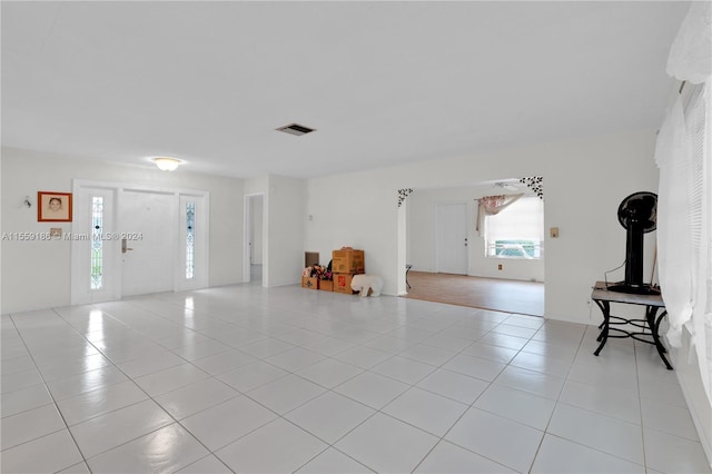 foyer with light tile patterned flooring