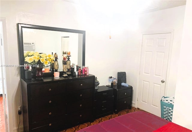 662 E 21st St, Hialeah, FL 33013 - bedroom featuring baseboards and dark wood-style floors