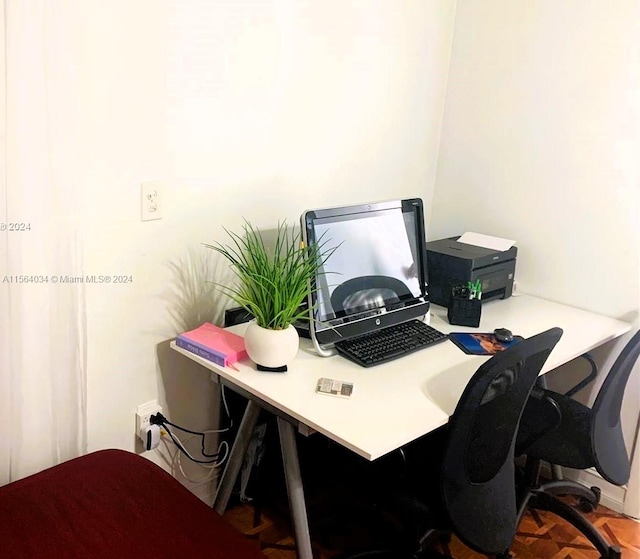 office featuring parquet flooring