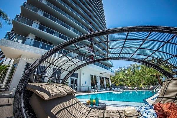 view of pool featuring a patio area