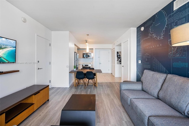 living room featuring light wood-type flooring