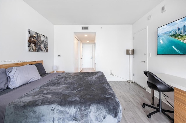 bedroom featuring light hardwood / wood-style flooring