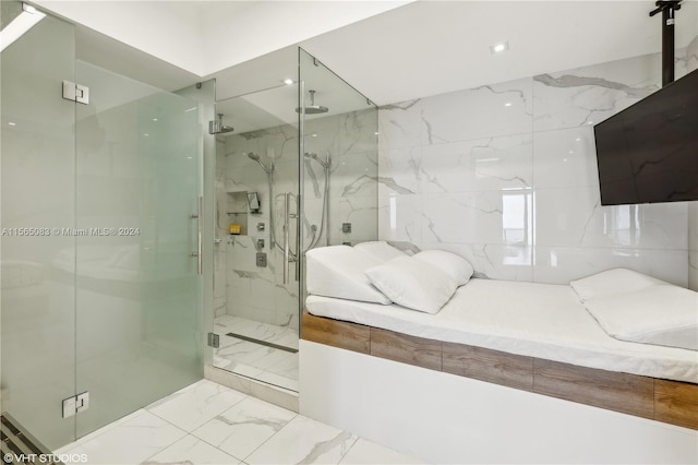 bathroom with an enclosed shower, tile flooring, and tile walls