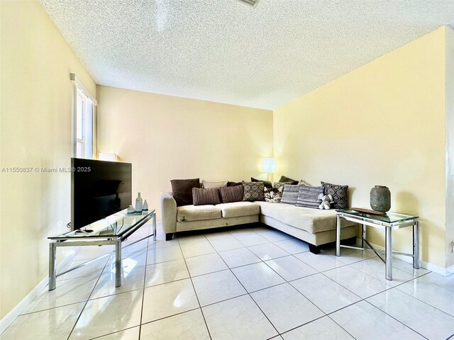 corridor featuring light tile flooring