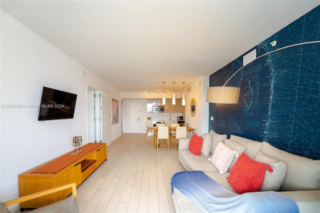 living room with light wood-type flooring