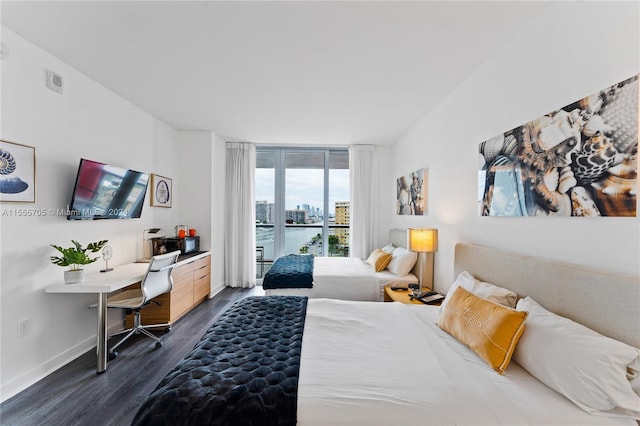 bedroom featuring dark hardwood / wood-style floors