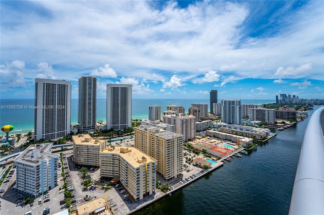 property's view of city with a water view