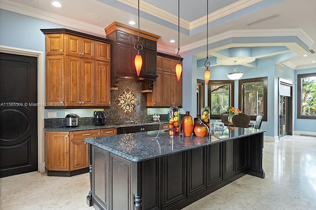 kitchen featuring light tile flooring, dark stone counters, custom exhaust hood, decorative light fixtures, and ornamental molding