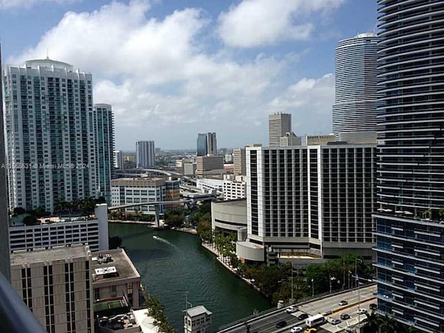 property's view of city with a water view