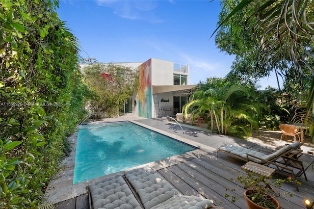 view of pool featuring a patio and pool water feature