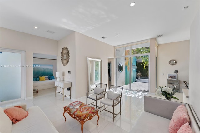 living room featuring light tile patterned flooring