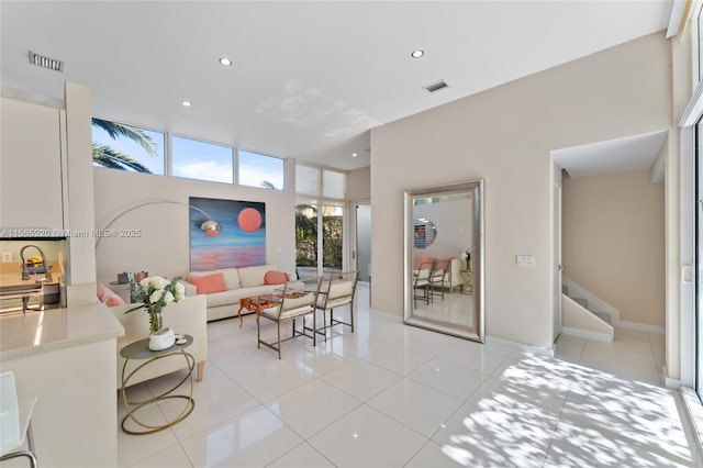 living room featuring light tile patterned floors