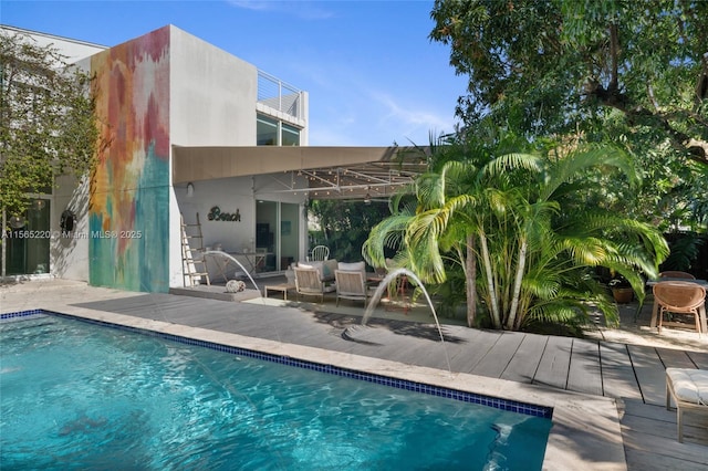 view of swimming pool featuring a patio