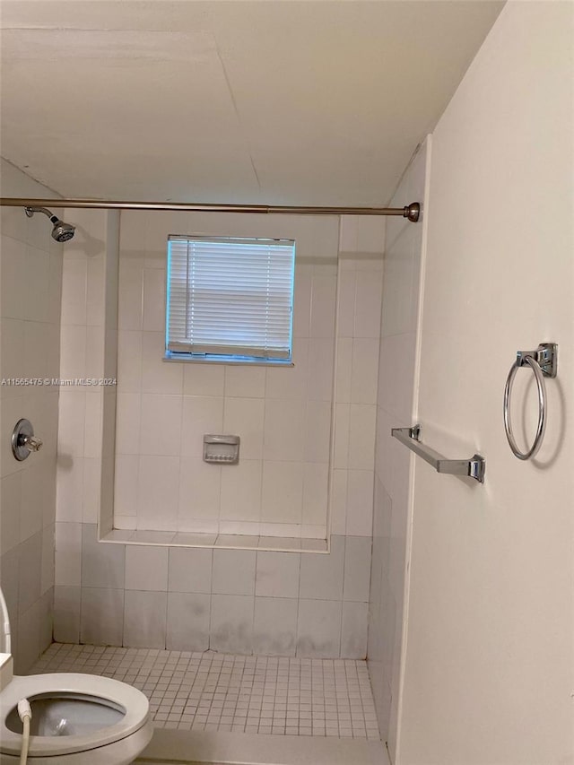 bathroom featuring tile patterned flooring and vanity