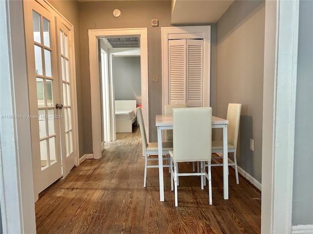 dining room featuring dark hardwood / wood-style floors