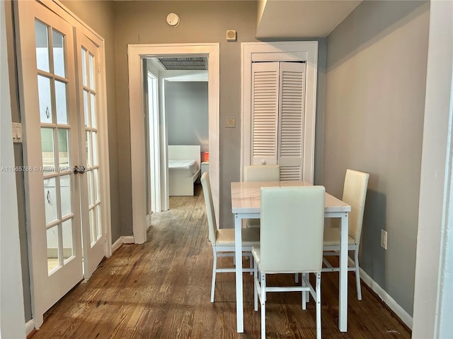 dining room featuring dark hardwood / wood-style floors