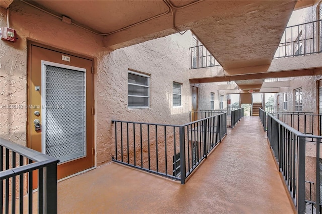 doorway to property with a balcony