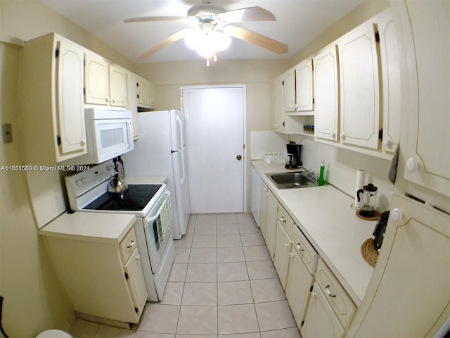 kitchen featuring white cabinetry, ceiling fan, white appliances, sink, and light tile flooring