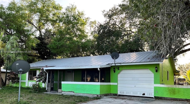 view of front of home featuring a garage