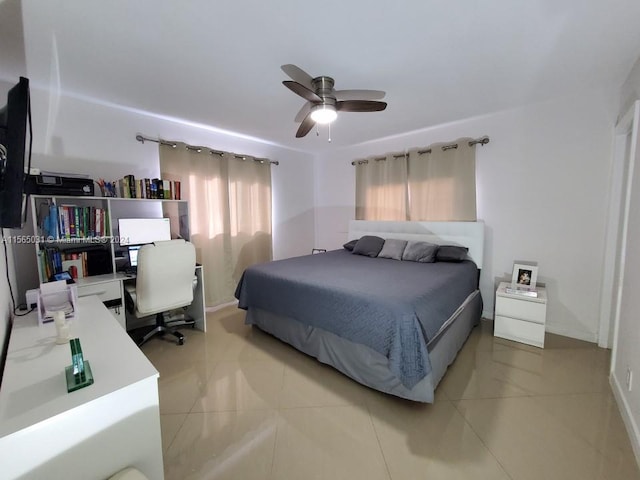 tiled bedroom with ceiling fan