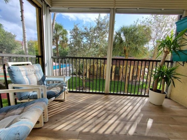 sunroom featuring a healthy amount of sunlight