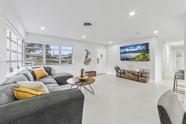 living room with light tile floors