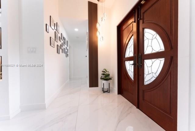 tiled bedroom with a closet