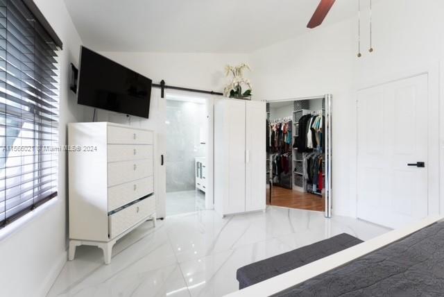 bedroom featuring a closet and ceiling fan