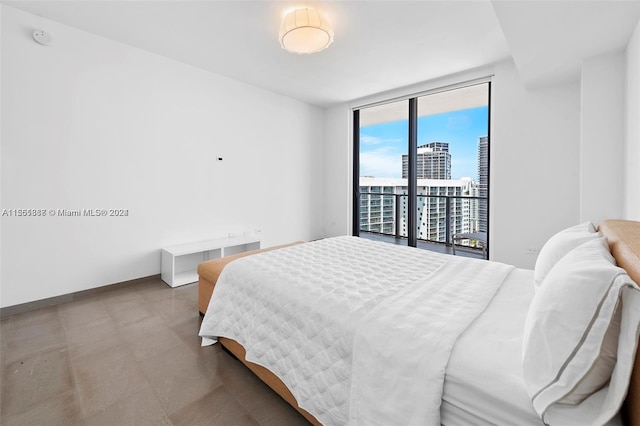 tiled bedroom with radiator heating unit, expansive windows, and access to outside