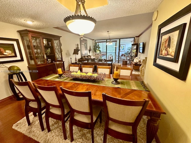 dining space with a textured ceiling