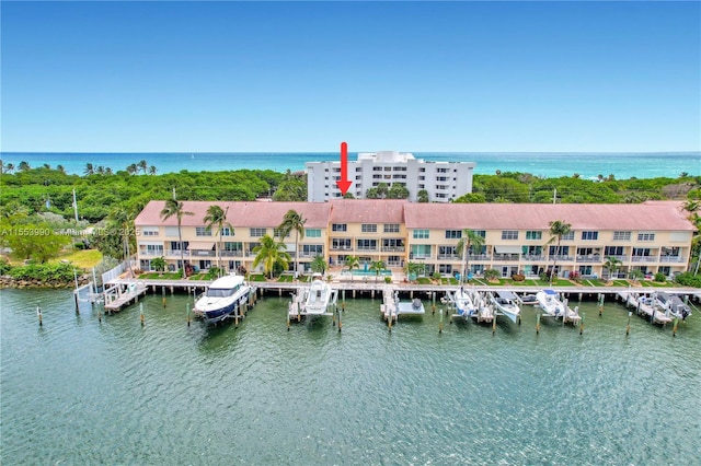 birds eye view of property featuring a water view