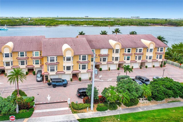 bird's eye view with a water view