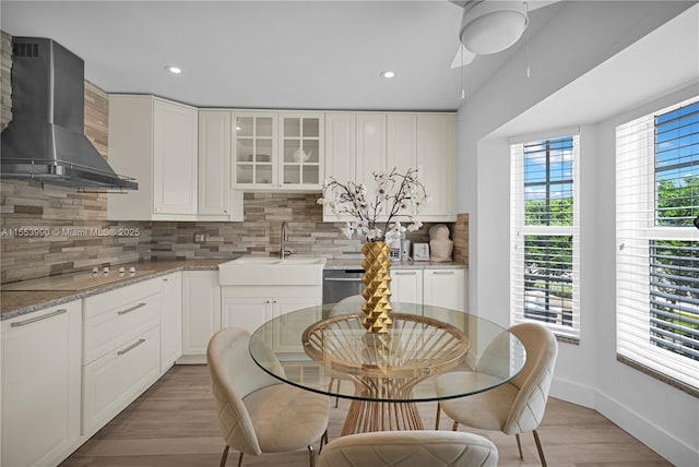 4234 N Ocean Dr, Hollywood, FL 33019 - dining room featuring ceiling fan, light wood-style flooring, and recessed lighting