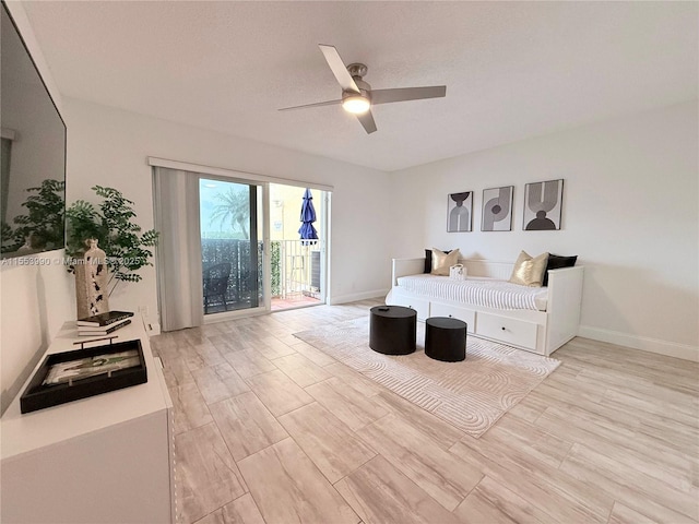 4234 N Ocean Dr, Hollywood, FL 33019 - bedroom featuring access to exterior, light wood-style flooring, and ceiling fan