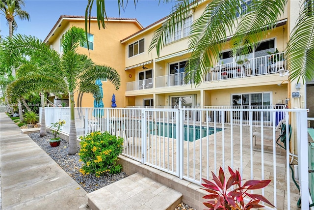 view of swimming pool with a patio