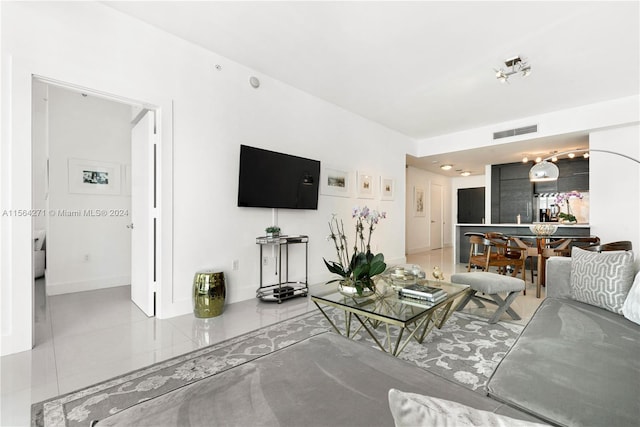 living room featuring light tile patterned flooring