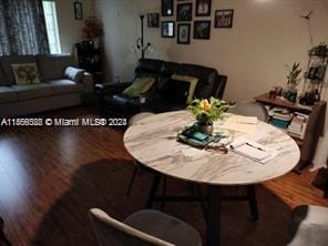 dining space featuring hardwood / wood-style flooring